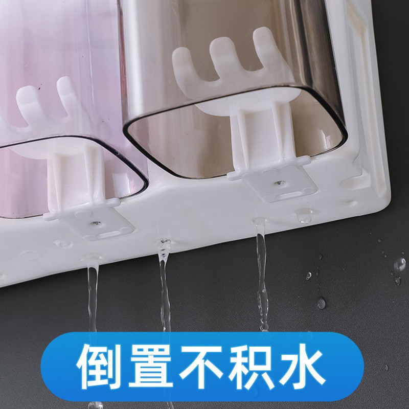 免打孔牙刷置物架 自动挤牙膏器套装 卫生间挂墙吸壁式漱口杯 三维工匠 透明杯两口牙刷架高清大图