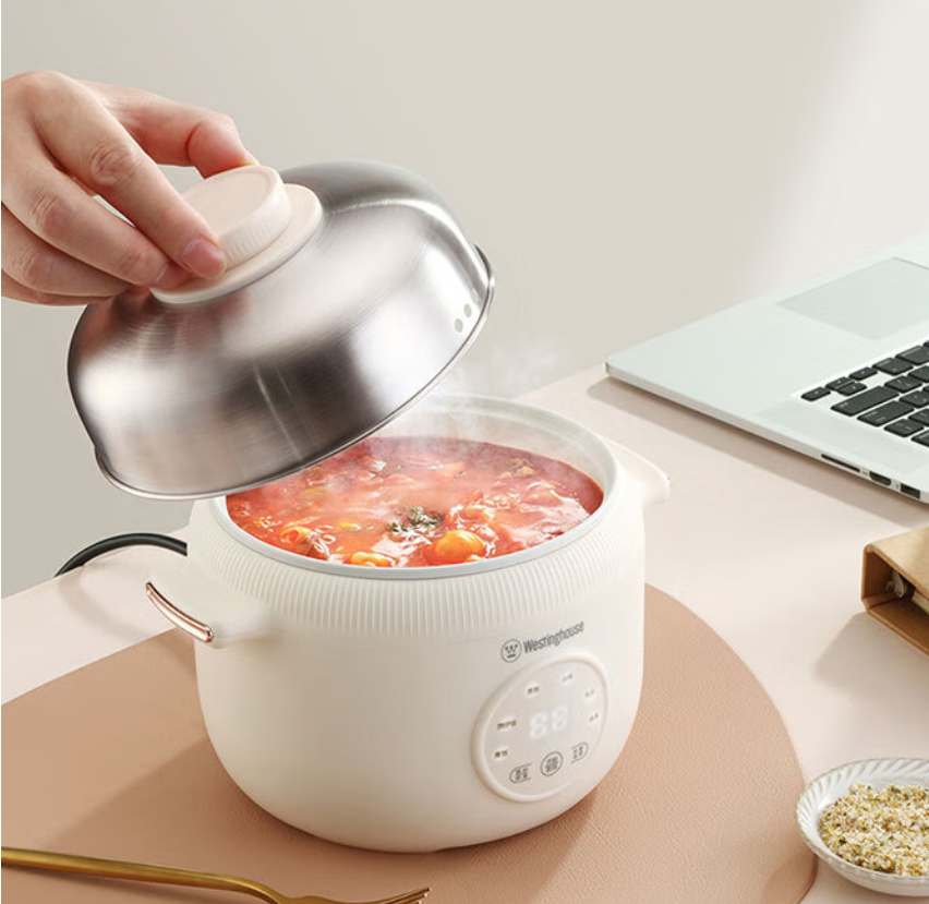 西屋圆形电饭煲WFB16L底盘加热均匀微电脑控制支持预约功能不粘内胆设计白色便捷智能高清大图