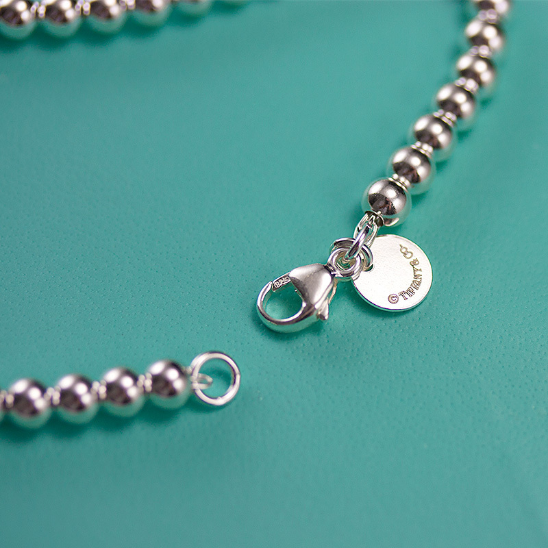 Tiffany&Co.:蒂芙尼经典款蓝心珠手链 S925银(链长可选)