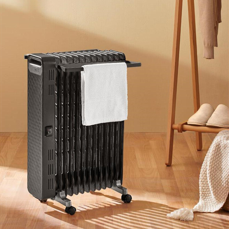 美的(Midea)取暖器油汀电暖器烤火炉13片家用办公室干衣2200W恒温镂空散热片安全防烫NYX-G1 (线下同款)