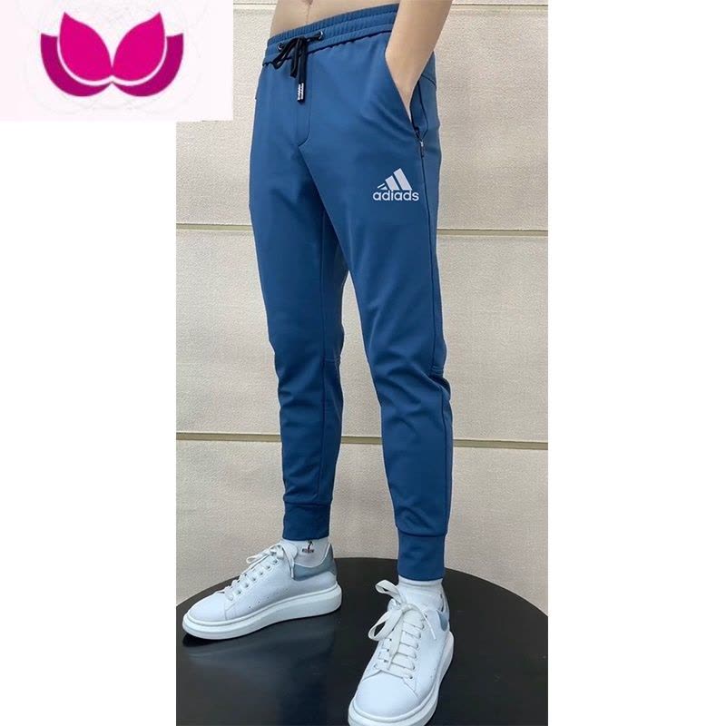 七斓夏季牛奶冰丝休闲裤男弹力透气九分速干裤新款潮牌印花小脚运动裤图片