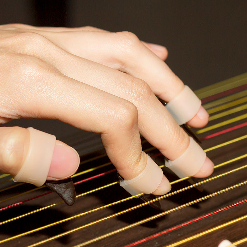 古筝指甲套胶布硅胶指甲免用胶布专业免胶带古筝指套配件透气彩色