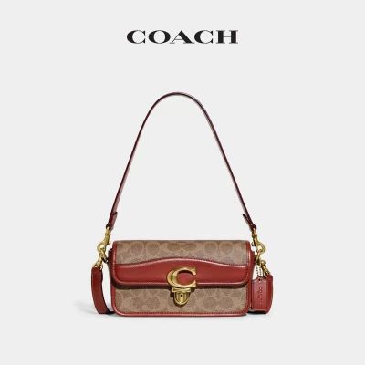 蔻驰（COACH）女包 新款女士STUDIO BAGUETTE系列手袋法棍包 单肩包 斜跨包 CE761 锈红色