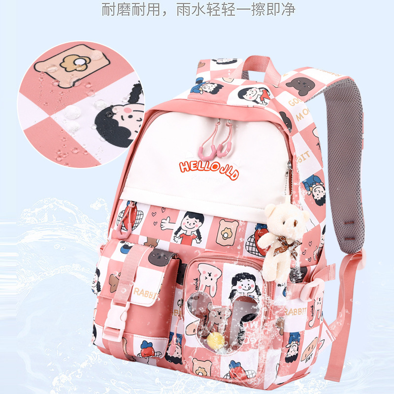 迪嘉乐小学生卡通可爱减负护脊三四五六年级初中生书包女简约带挂件减负双肩包