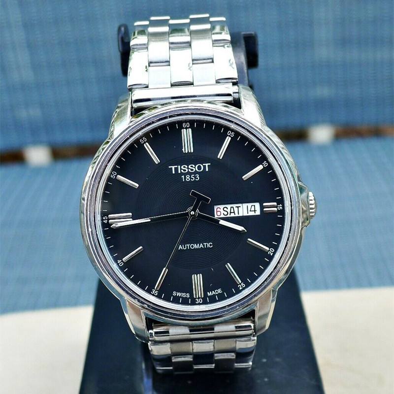 天梭男表 瑞士1853海星恒意系列全自动机械表男 夜光双日历钢带t065.