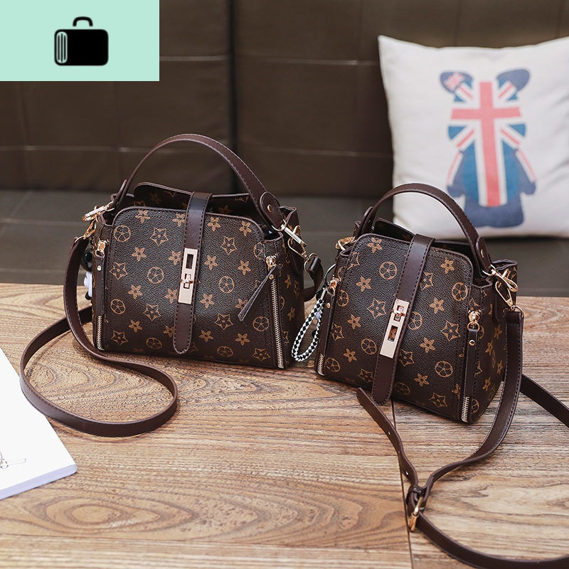 新款韩版女士斜挎包百搭水桶包时尚印花女单肩包手提斜挎两用包NEW LAKE女士单肩包