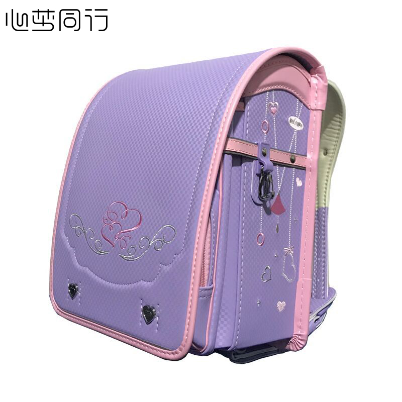 心梦同行 小学生书包儿童护脊防水双肩背包2213/个高清大图