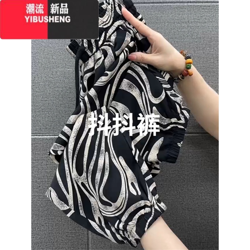 YIBUSHENG时尚百搭休闲裤女季新款大码宽松束脚抖抖裤胖mm显瘦速干小花款 L推荐100-115斤 黑色纹路