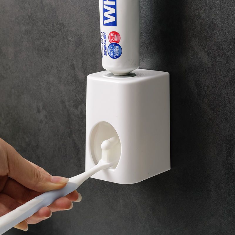 自动挤牙膏器浴室自动挤牙膏器粘贴式壁挂牙膏架牙刷置物架吸壁式牙膏