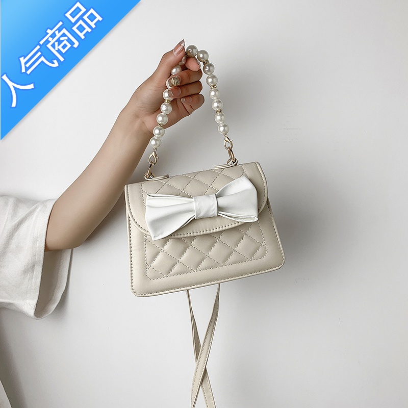 封后马卡龙蝴蝶结迷你包包珍珠女包2022新款潮日韩百搭单肩斜挎小包女斜挎包