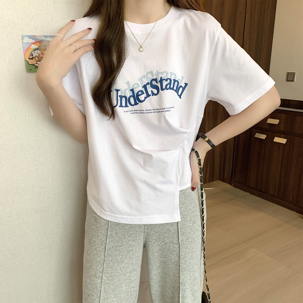 [1折价26.9元叠加优惠券]唐狮短袖T恤女夏季短款不规则设计上衣圆领显瘦时尚百搭高清大图