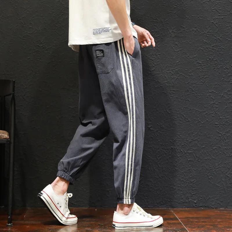 夏季休闲裤子男大码九分裤条纹日系宽松束脚裤运动亚麻潮流棉麻裤 莎丞