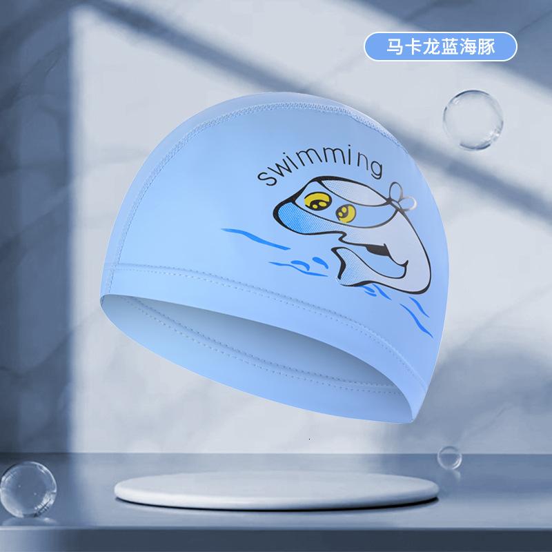 儿童泳帽PU涂层卡通可爱男女童防水护耳定 制logo游泳帽厂家直销 马卡龙蓝海豚