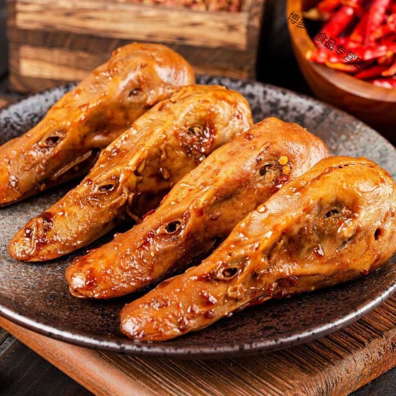 香辣鸭头麻辣网红熟食特麻特辣卤味鸭头整只真空休闲零食小吃批发图片