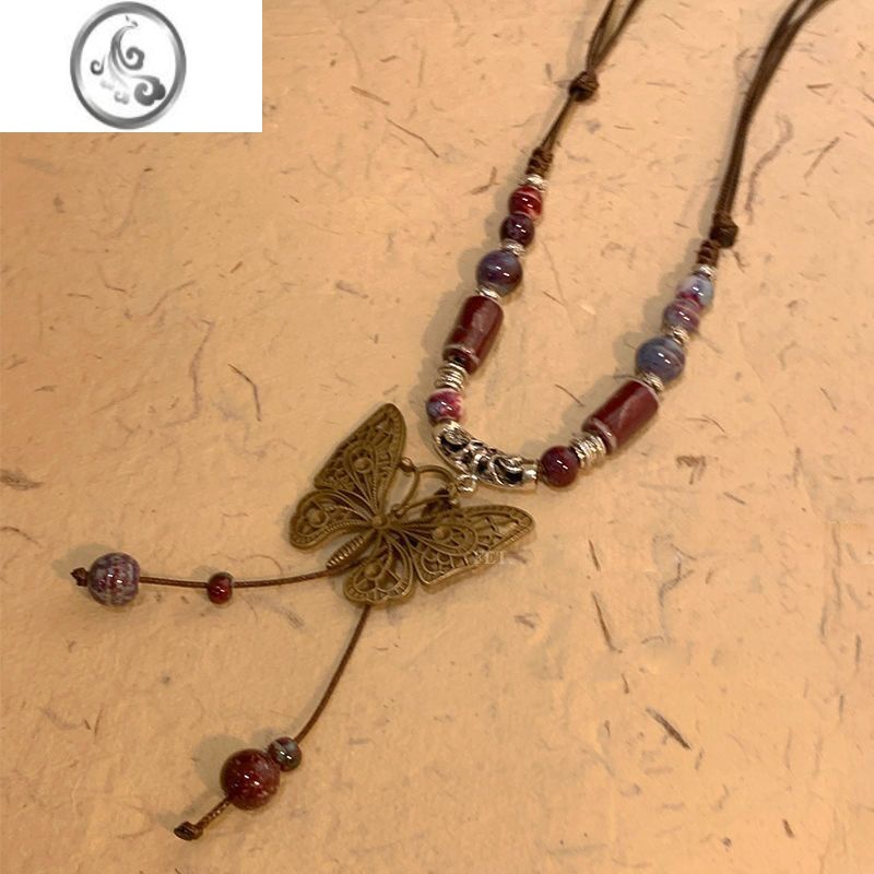 JiMi复古民族风陶瓷蝴蝶铃铛吊坠项链女2023年新款潮长款毛衣链配饰品