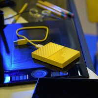 西部数据（WD）My Passport 4T 2.5英寸 清新黄USB3.0高速移动硬盘 WDBYFT0040BYL