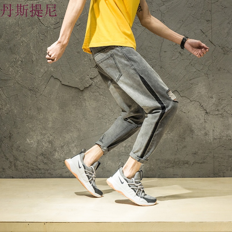 春秋破洞牛仔裤男刮烂宽松休闲港风潮裤子灰色乞丐哈伦九分裤小脚