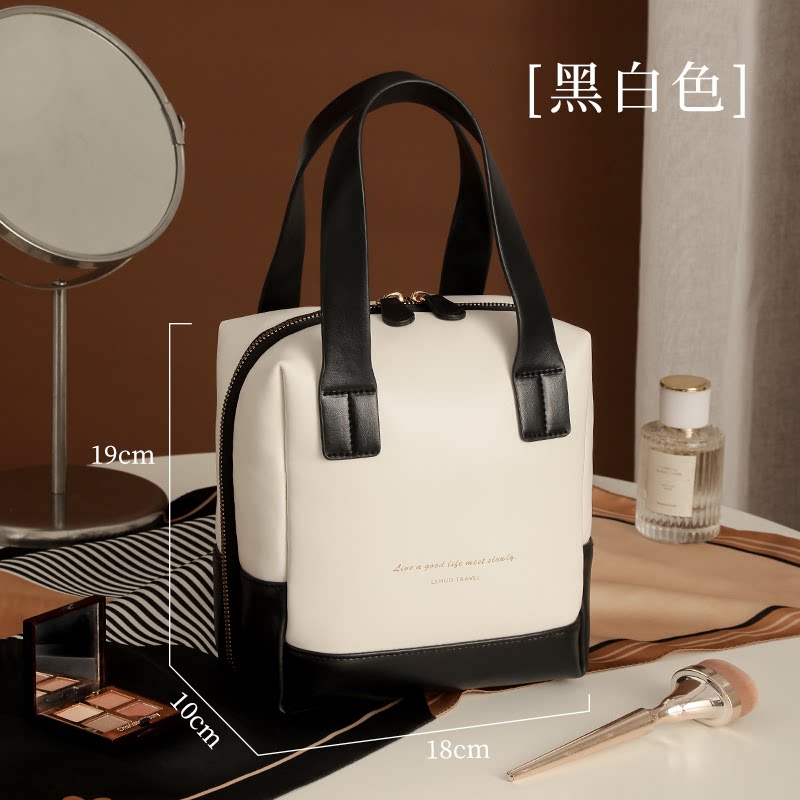 化妆包女2025新款高端大容量便携式护肤品收纳旅行洗漱袋手提 黑白色大号