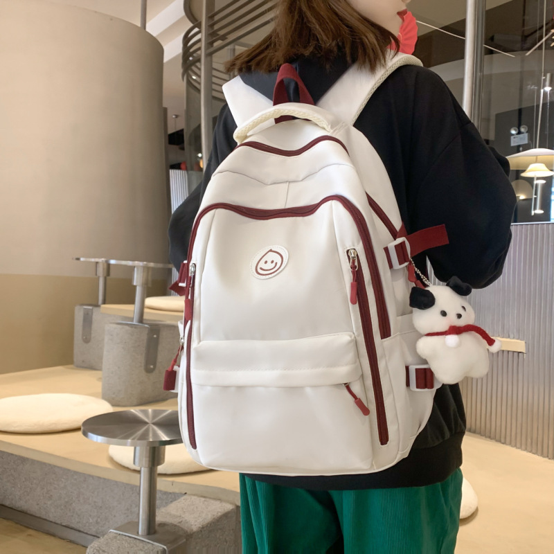 书包女韩版休闲大容量双肩包小学高中生学生书包初中生通勤背包