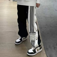 阿迪达斯 （adidas）服装运动裤女裤春秋款三叶草休闲裤宽松小脚裤卫裤长裤