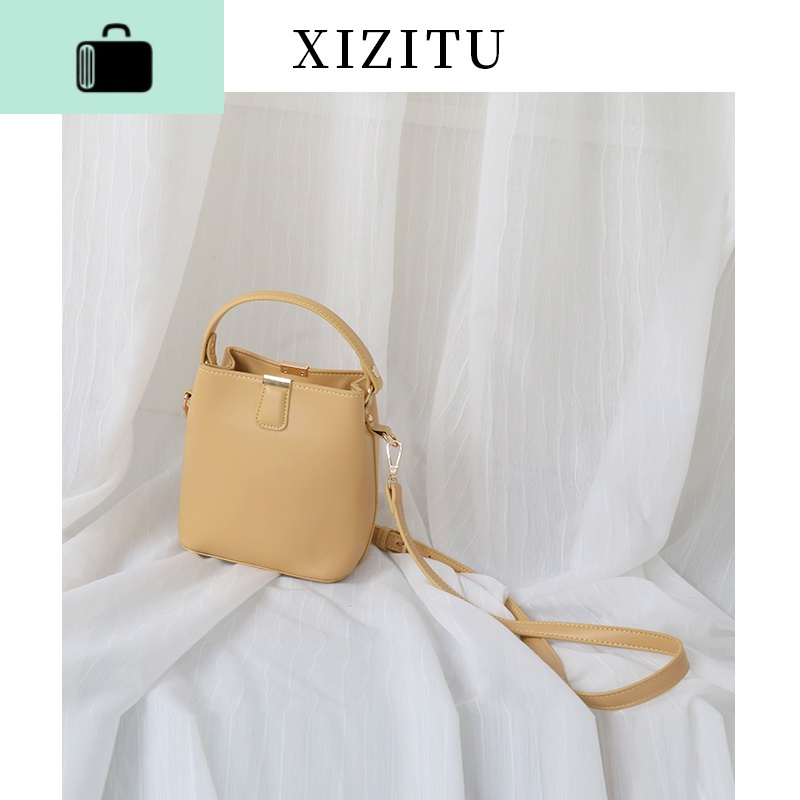 奶色水桶包夏天包包女2020新款韩版简约百搭单肩斜挎手提小包newlake