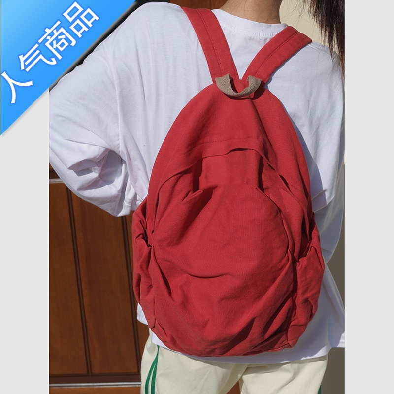 封后日系水洗帆布双肩包女简约百搭大学生书包女慵懒风高中垂感背包女