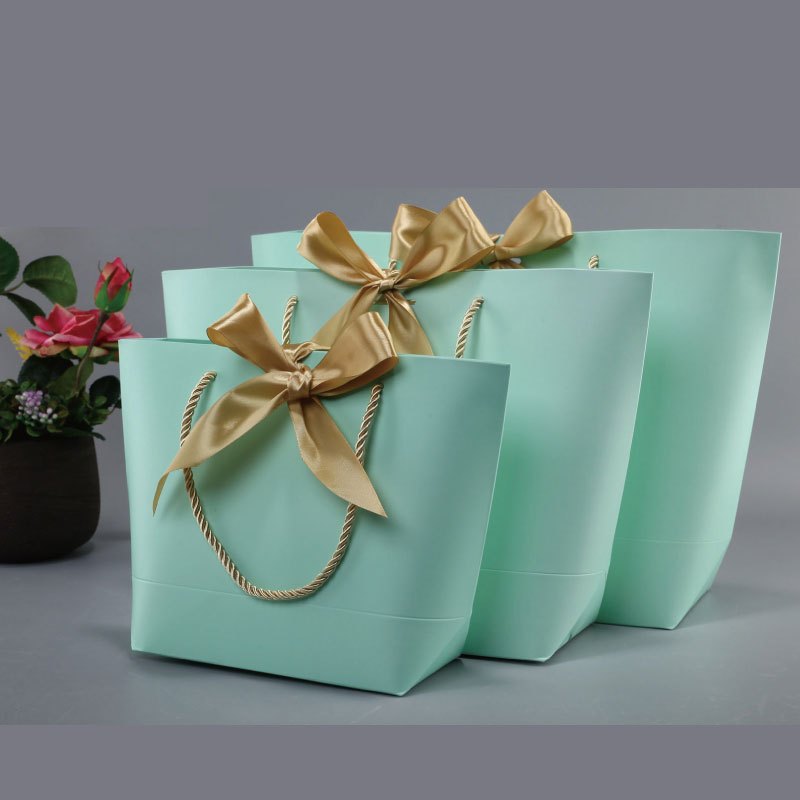 高档衣服手提袋纸袋服装店化妆品女装礼品袋纸质袋子生活日用收纳用品