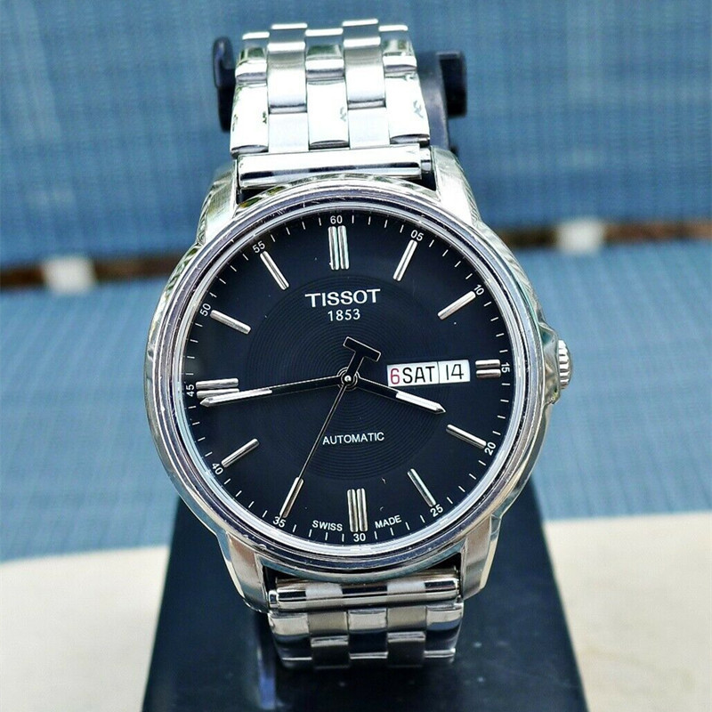 天梭男表 瑞士1853海星恒意系列全自动机械表男 夜光双日历钢带t065.