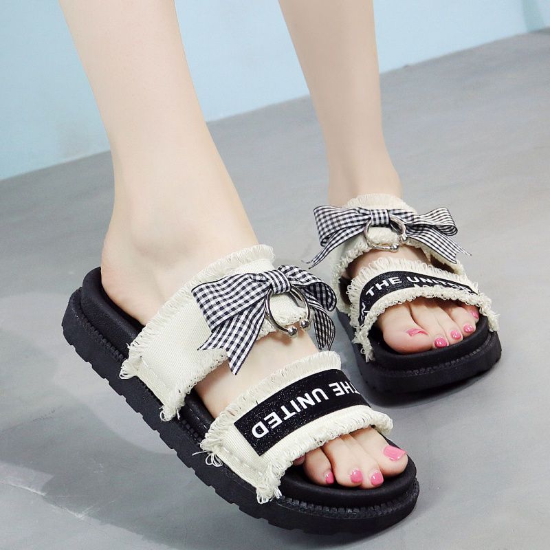 拖鞋女夏季韩版时尚防滑平底沙滩拖鞋蝴蝶结凉拖露趾学生外穿凉鞋黑色