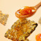 来伊份 黑金锅巴240g咸蛋黄味膨化食品 糯香乌饭糯米休闲零食小吃独立包装