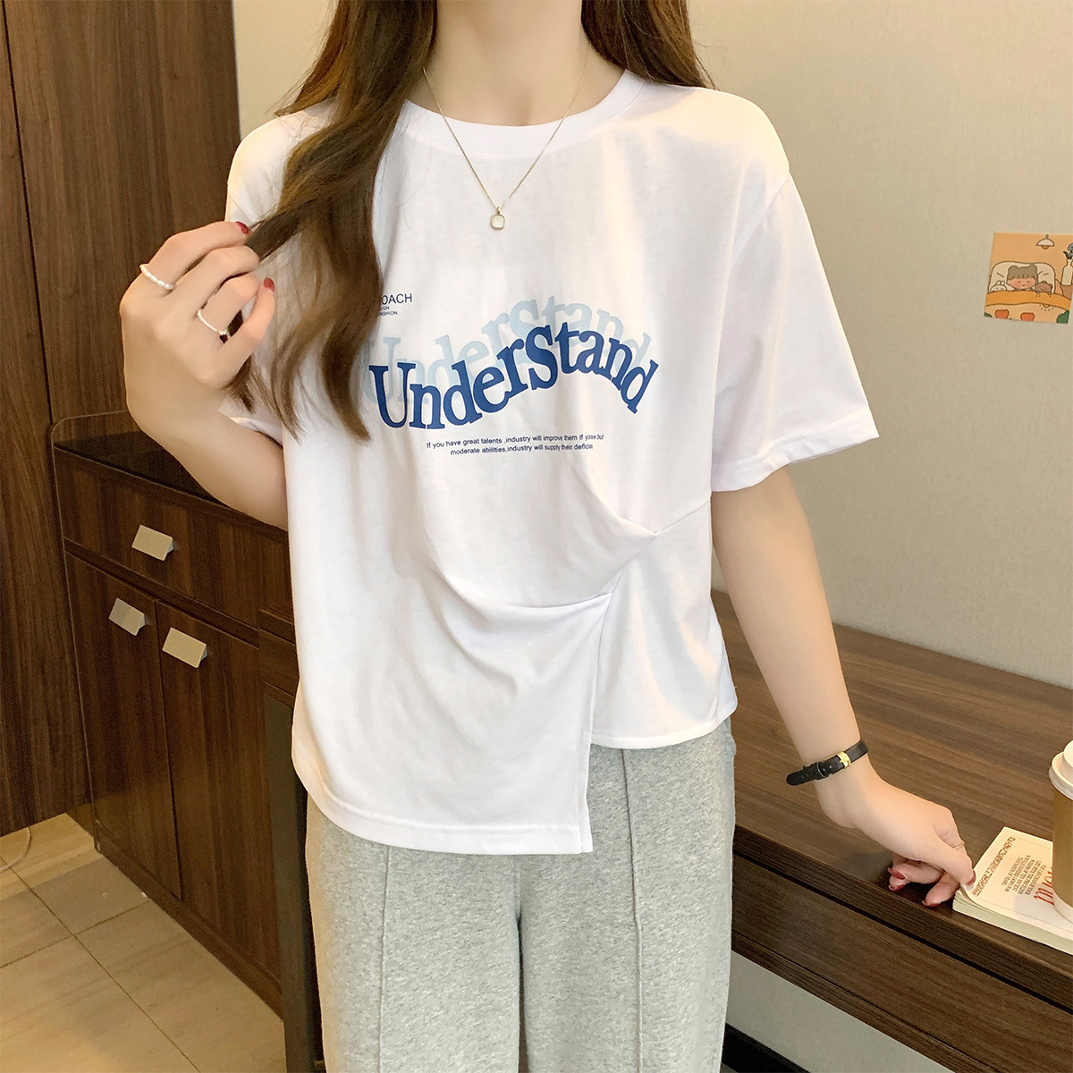 [1折价26.9元叠加优惠券]唐狮短袖T恤女夏季短款不规则设计上衣圆领显瘦时尚百搭高清大图