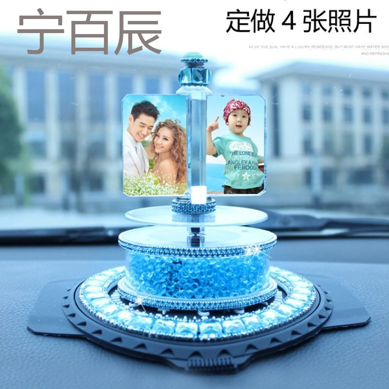 汽车摆件创意潮太阳能摇头旋转多功能车用香水座男士车内饰品