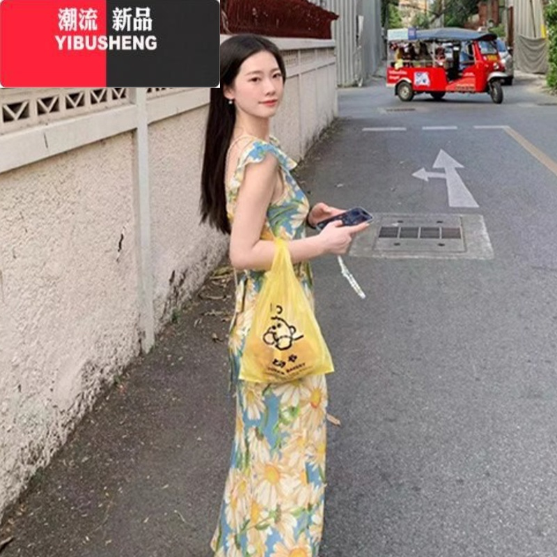 YIBUSHENG茶歇法式油画碎花吊带连衣裙子女装季2024新款海边度假沙滩长裙
