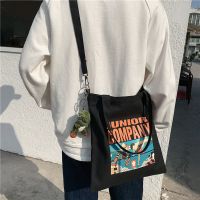 帆布袋ins中包斜挎日系男士背包韩版文艺单肩包简约手提袋情侣包 海王质感黑(可装课本)