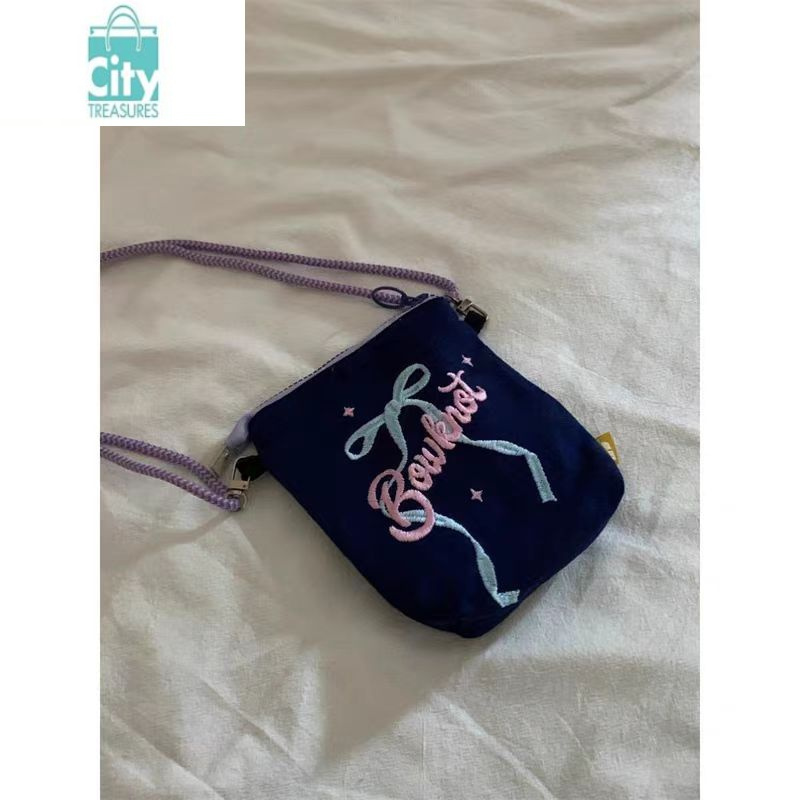 可爱蝴蝶结斜跨包女2024新款时尚帆布包休闲手机包小众通勤单肩包