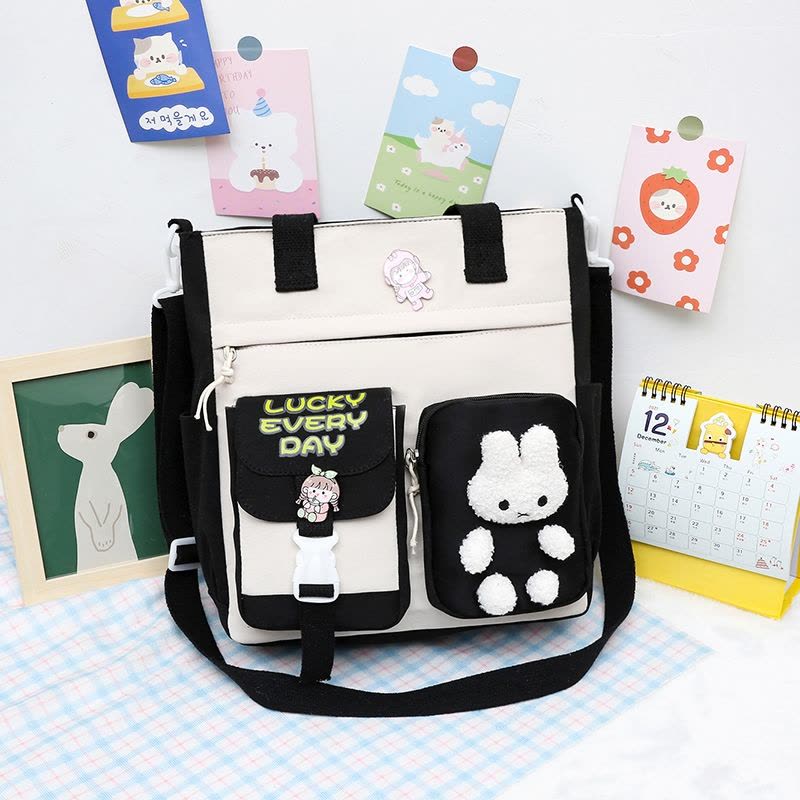 静蝉幽格小学生补习袋中学生手提拎包男女儿童补课包单肩书包兴趣班斜挎包图片