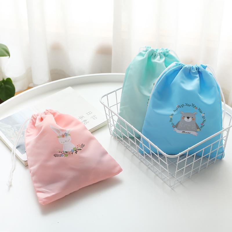 家柏饰(CORATED)防水布袋子旅行收纳套装内衣收纳包行李箱衣服整理包抽绳束口袋 粉色小号