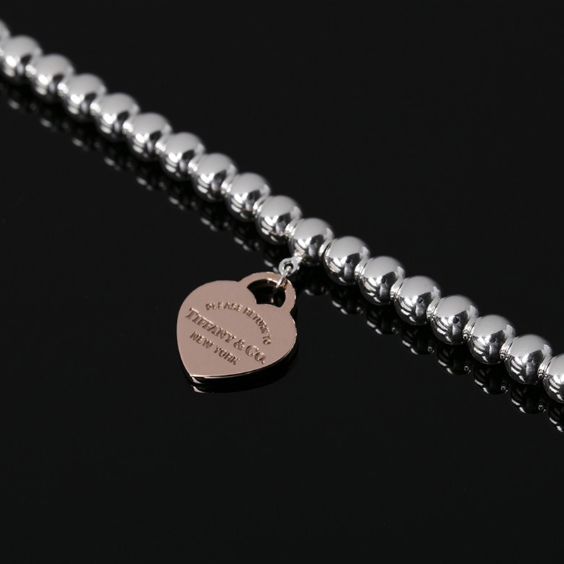 [直营]TIFFANY&CO.蒂芙尼 925银 欧美风格 女士金属心型吊饰纯银串珠手链 送恋人
