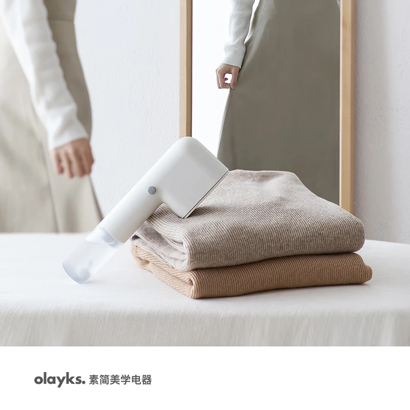 欧莱克OLAYKS 家用小型便携式蒸汽烫斗旅游出差速热除螨杀菌手持挂烫机(陶白) OLK-IM01 -GTJ00201高清大图