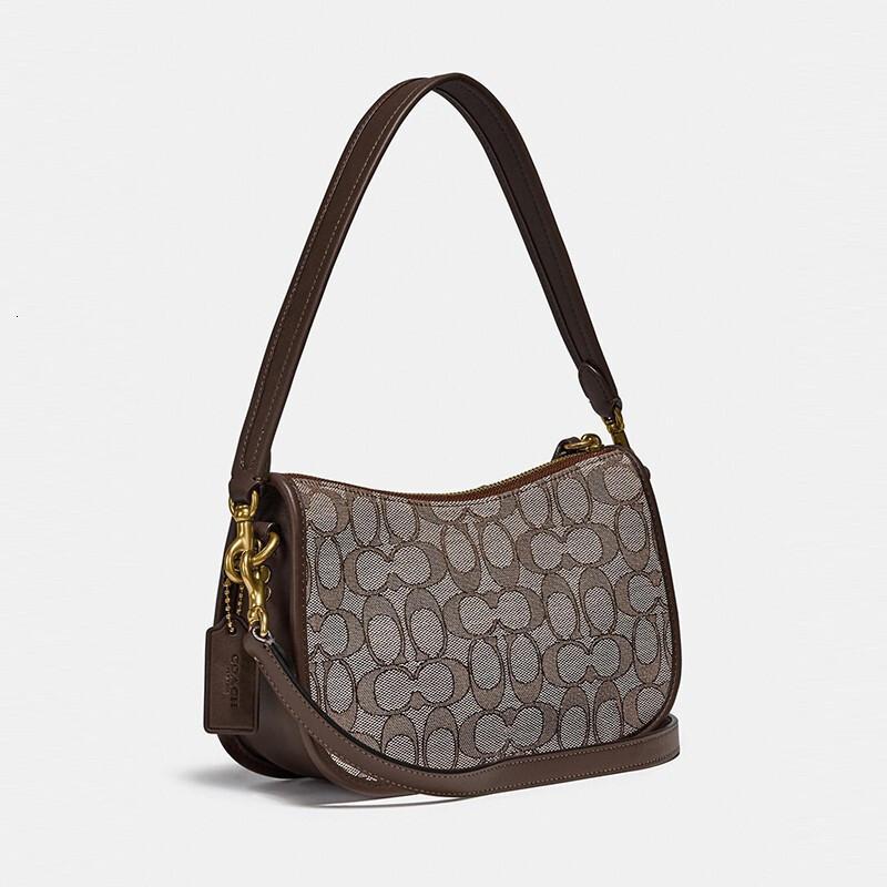 coach蔻驰女包swinger系列月牙腋下包复古扭锁女士手提单肩斜挎包