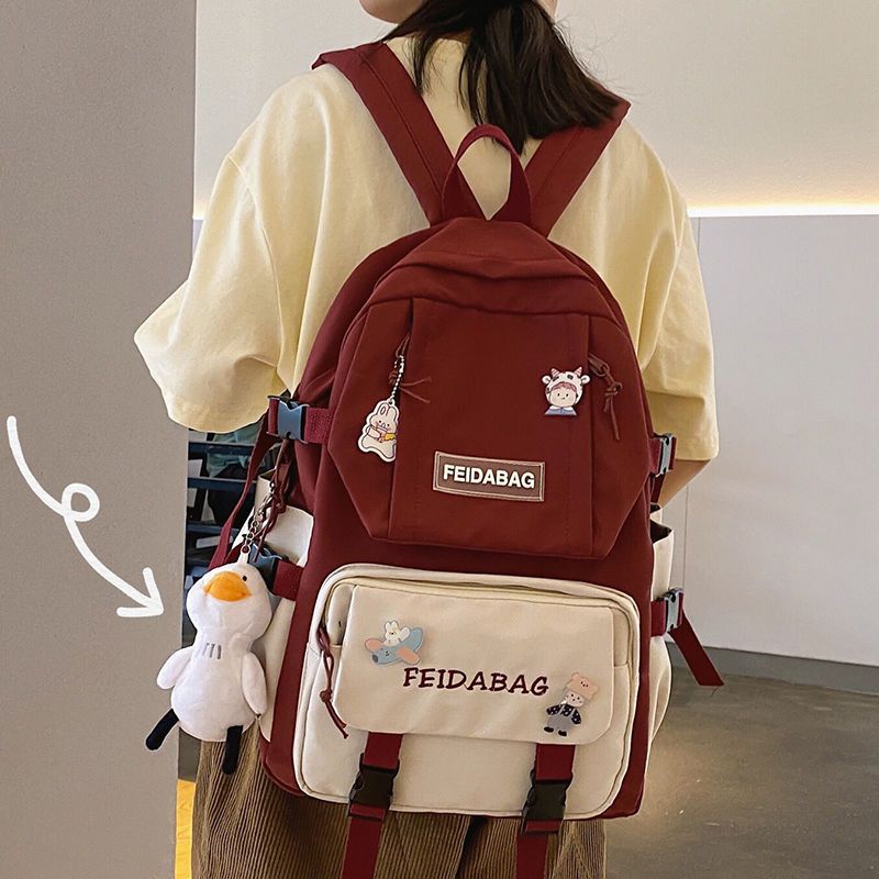 2021年新款书包女高中大学生夏天日系初中大容量双肩包小学生背包 黑色送鸭子挂件和徽章