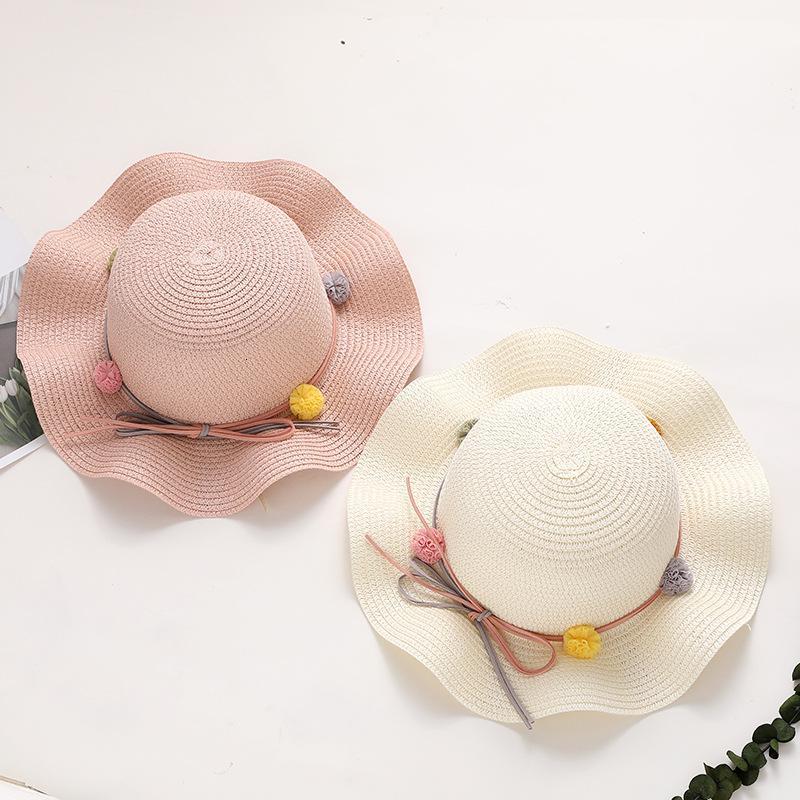 春夏帽子儿童草帽简约百搭毛球遮阳沙滩短檐海边女童遮阳帽可爱