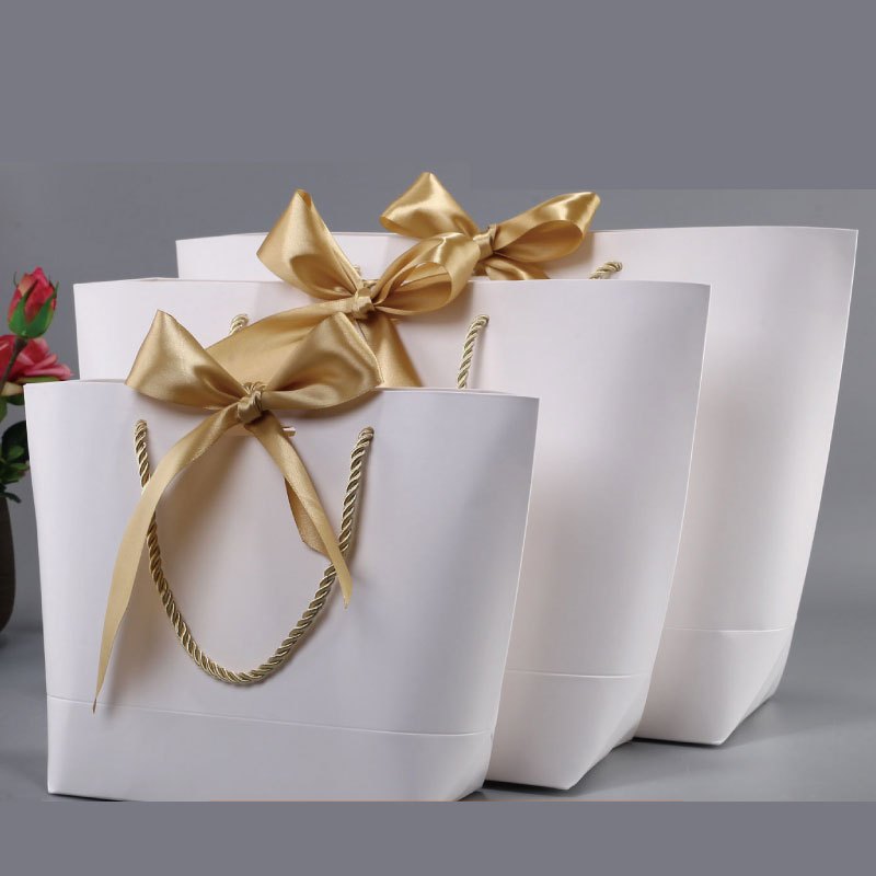 高档衣服手提袋纸袋服装店化妆品女装礼品袋纸质袋子生活日用收纳用品