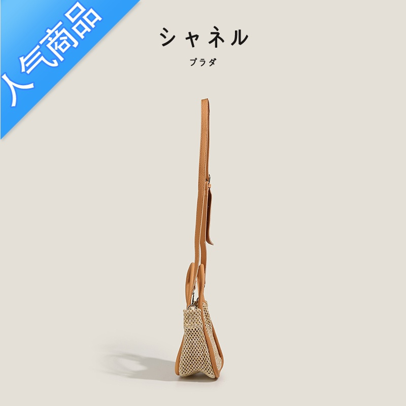 封后プラダ2022夏季新款草编包休闲单肩水桶包百搭流行藤编斜挎包