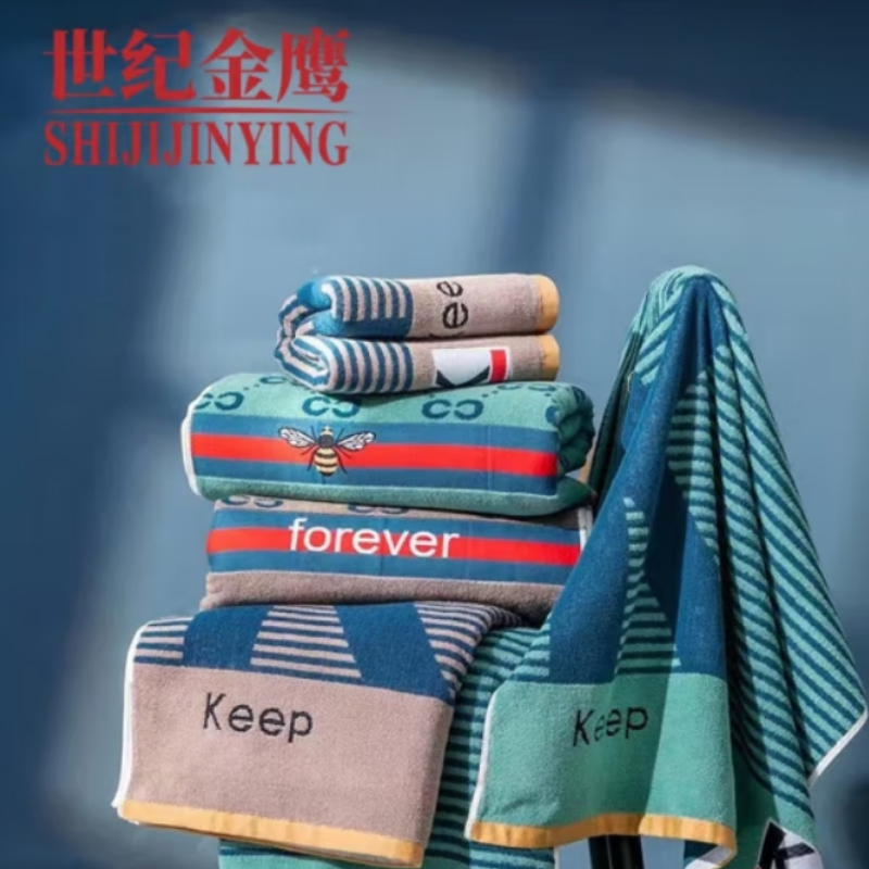 世纪金鹰 32股纱全棉提花断档浴巾 450克*1 条高清大图