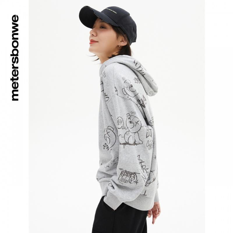 [1件5折价:119.5]美特斯邦威连帽套头卫衣女新款时尚宽松印花女士上衣