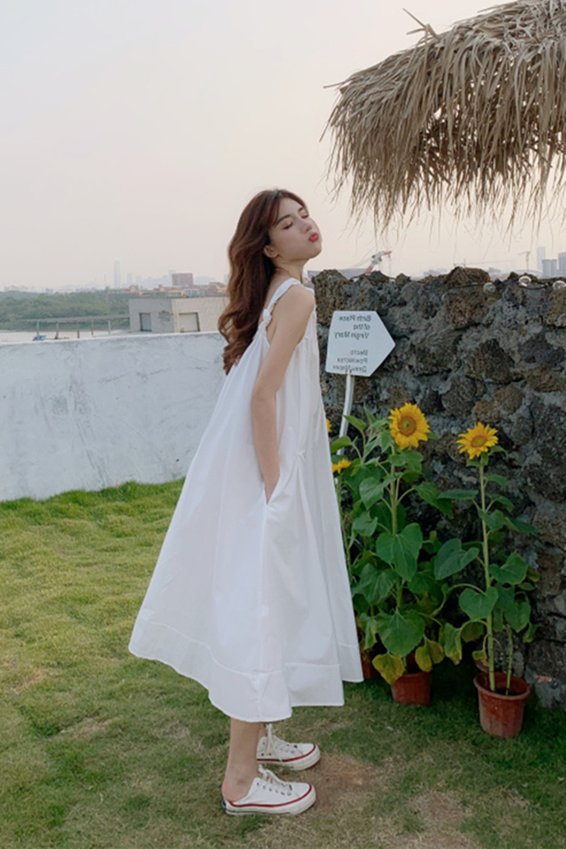 艳如飞三亚旅游衣服女2020新款沙滩长裙超仙海边度假白色宽松吊带