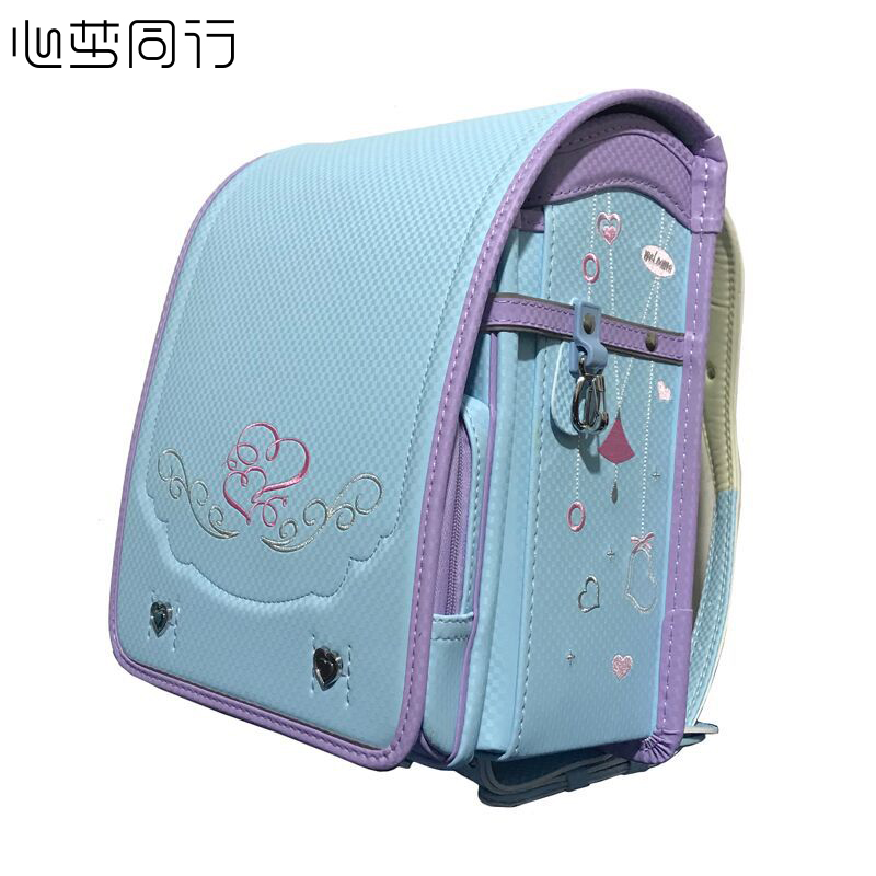 心梦同行 小学生书包儿童护脊防水双肩背包2213/个高清大图