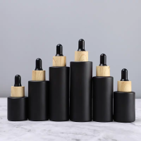 现代滴管瓶素茶色分装瓶化妆品高档避光玻璃空瓶 60ml茶色瓶黑圈黑胶头 单个