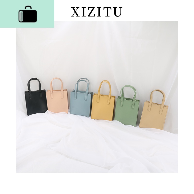 迷你手提包竖款斜挎小包女日韩新款简约百搭单肩手拎马卡龙小方包NEWLAKE高清大图